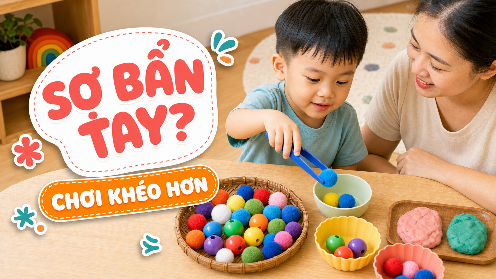 Bé dùng kẹp gắp pom pom vào chén để luyện vận động tinh cùng mẹ